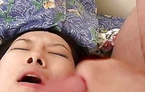Low-spirited Asian slattern gets a massive facial cumshot - classic slattern video