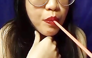Super morose Asian girl pretend pussy and drink some juice 1