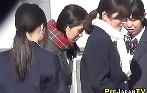 Japan students peeing