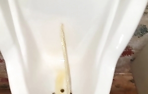 Pissing at public urinal, showing capacity of my kegel muscles _)