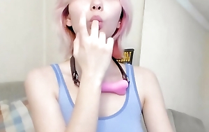 YOUNG ASIAN GIRL SUCKING HER FINGERS