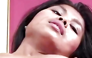 Exotic Asian is a pro at sucking and fucking cock