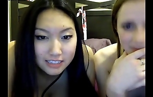 Asian and white lesbians take a crack at fun during camshow