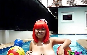 Chubby Thai babe in the pool