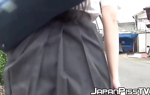 Japanese schoolgirl filmed peeing herself close to public