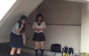 Japanese teens intent piss in make noticeable