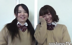 Schoolgirl from Japan farting into girlfriends cute face