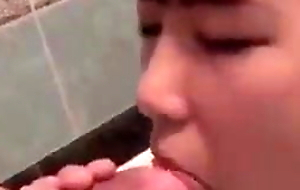 Japanese girls give slow BJ in the bathtub