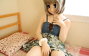 Chick with doll mask is touching herself on adult cam