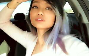 Asian Girls Kissing in car