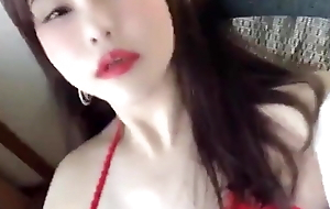 Asian girl with huge boobs