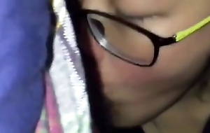 Chinese girl wearing glasses gives blowjob