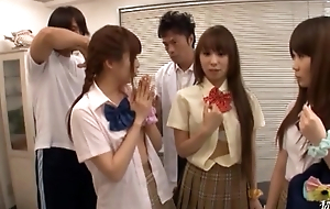 Lovable Japanese schoolgirls respecting wild cum filled orgy