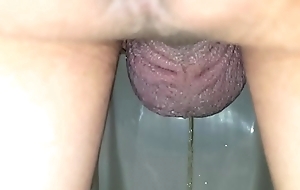 Post-sex public urinal piss, viewed between legs