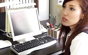 Japanese brunette office lady Yura Hitomi cock sucked coupled with dildo playing in office uncensored.